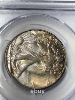 1946 P Walking Liberty Half Dollar PCGS MS66+ CAC Green Toned (PCGS Pop 120)