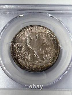 1946 P Walking Liberty Half Dollar PCGS MS66+ CAC Green Toned (PCGS Pop 120)