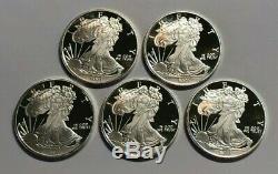 Lot of 5 1 oz. 999 Fine Silver Sunshine Mint Walking Liberty Rounds in Flips