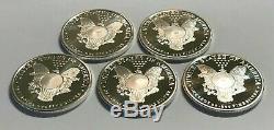 Lot of 5 1 oz. 999 Fine Silver Sunshine Mint Walking Liberty Rounds in Flips