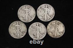 Lot of 5 Walking Liberty Half Dollars. 90 Silver All Coins have readable Dates