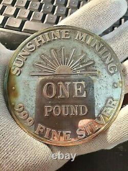 One Pound 1990 Sunshine Mining. 999 Silver Round