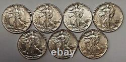 Seven Beautiful 1942 Silver Walking Liberty Half Dollars Grading AU Gorgeous