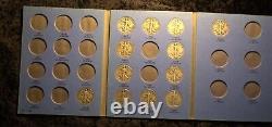 Walking liberty Half Dollar Partial set 12 coins in Whitman folders